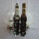 Pair of silver metal and glass sconces