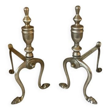 Pair of Victorian brass fire dogs from the late 19th century.