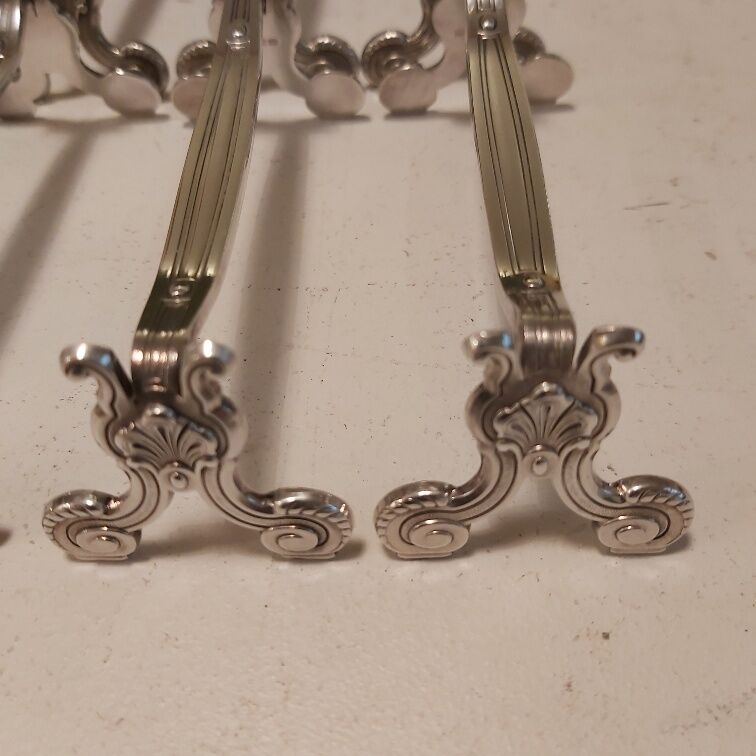 Ensemble de 12 porte-coûteaux Christofle métal argenté