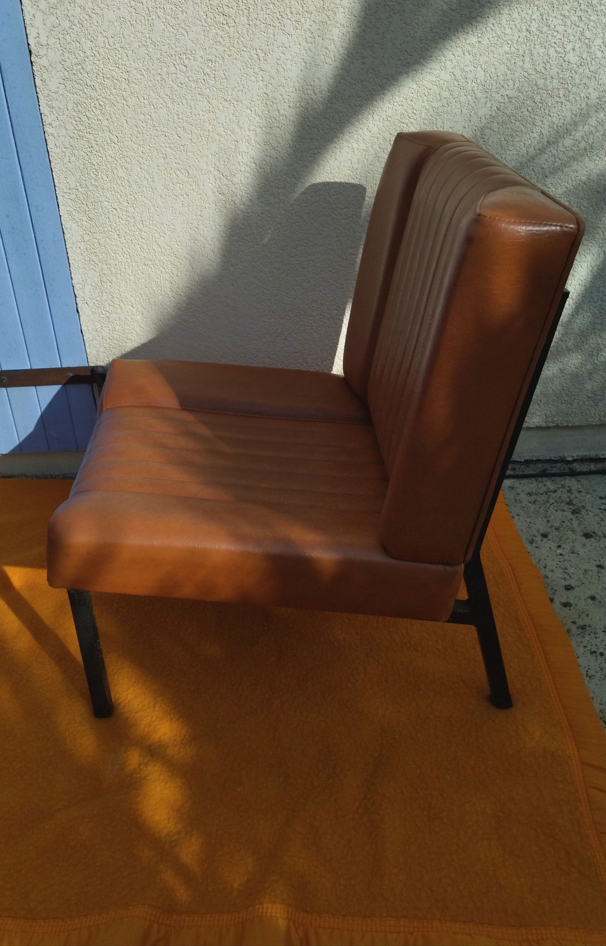 Pair of lounge armchairs, 70s leather
