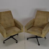 Pair of mid-century swivel armchairs with wheels 1970's