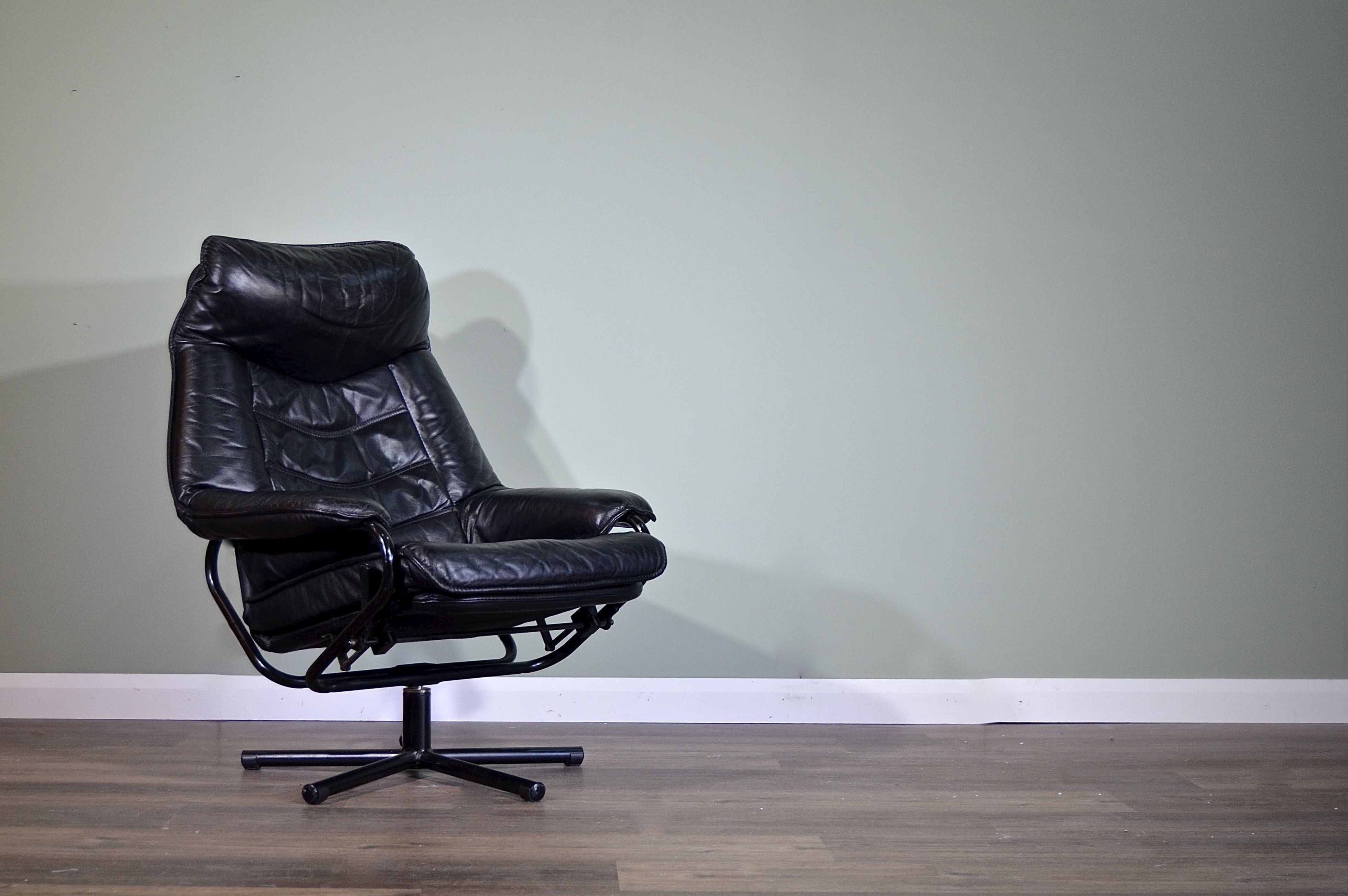 Norwegian Skoghaug industries vintage black leather swivel reclining chair