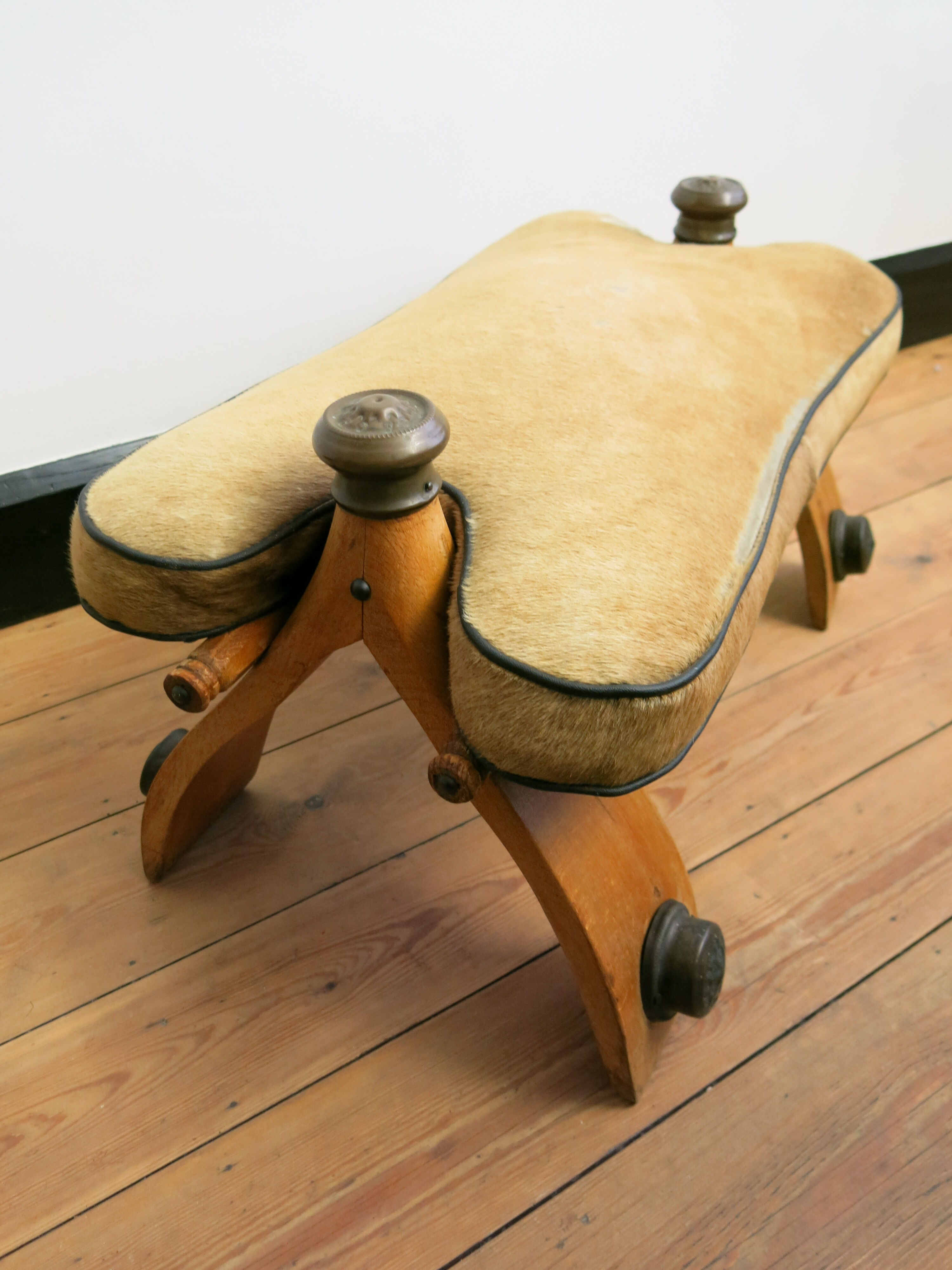 Camel saddle stool