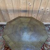 Tripod table with a sculpted top