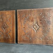 Pair of antique decorative panels in carved wood, late 19th century.