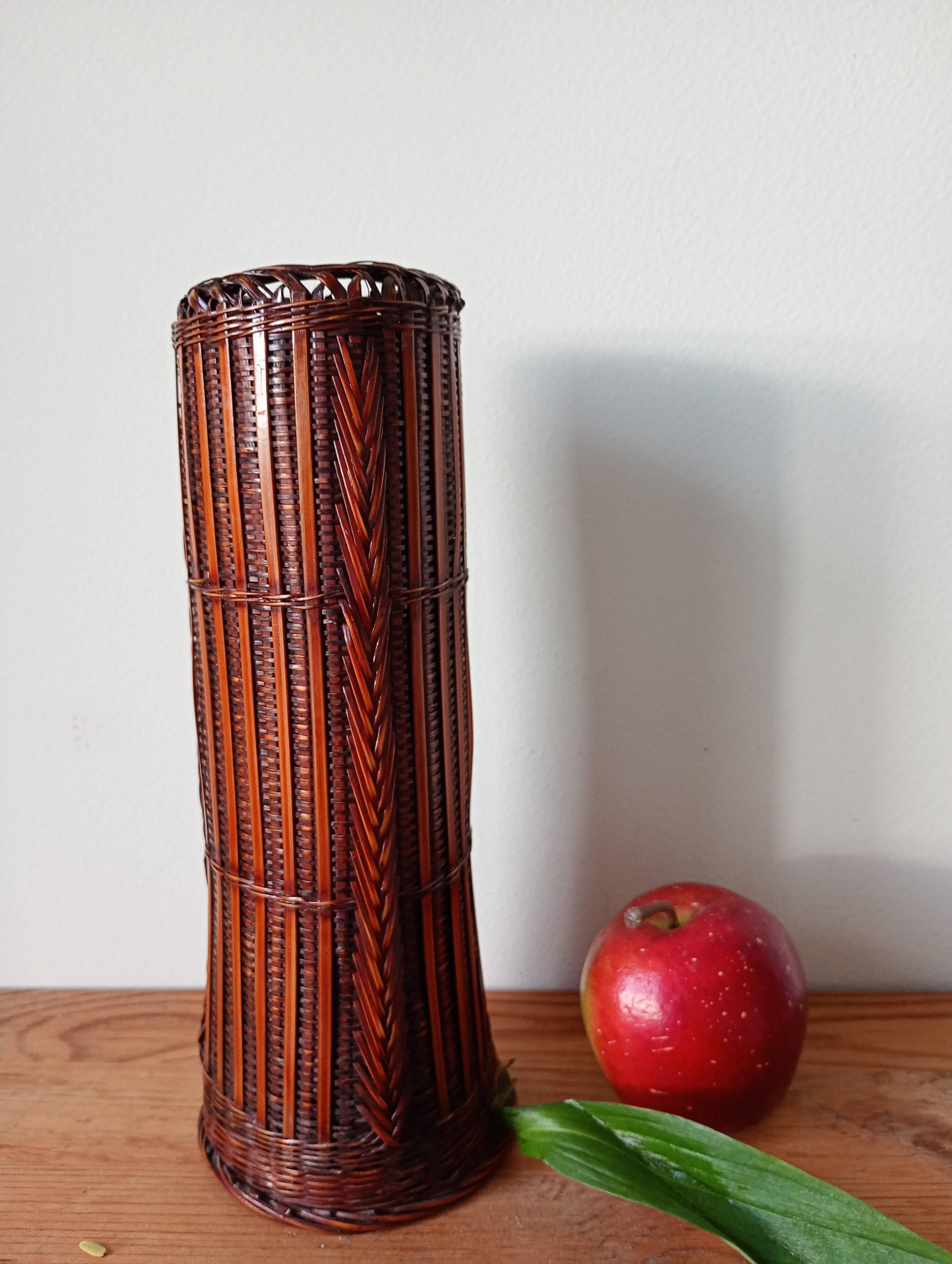 Japanese vase made of woven bamboo. Ikebana