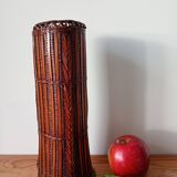 Japanese vase made of woven bamboo. Ikebana