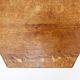 Hexagonal pedestal table or side table with a lattice structure and star pattern.