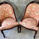 Pair of carved solid mahogany gondolas from the 19th century