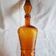 Large Empoli bottle in textured amber glass