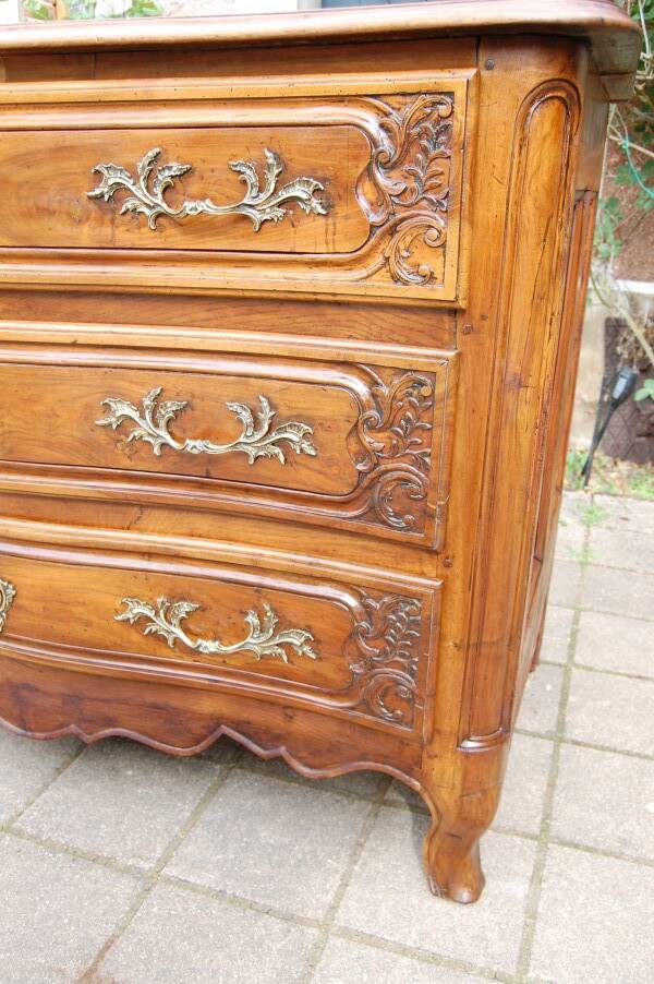 18th-century Louis XV walnut commode.