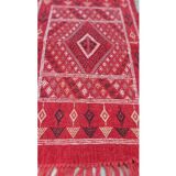 Red hand-woven carpet in pure wool