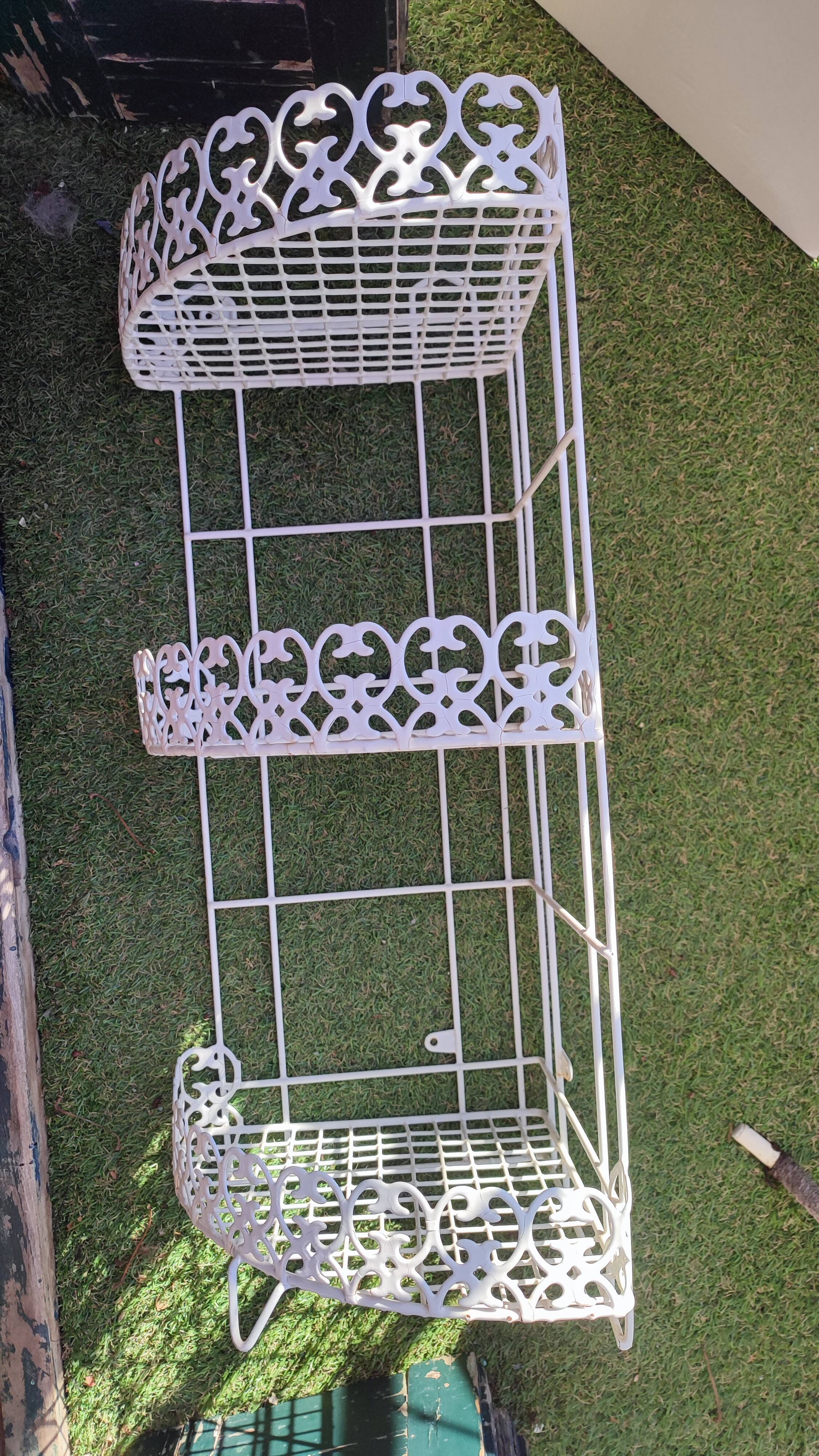 White metal corner shelf