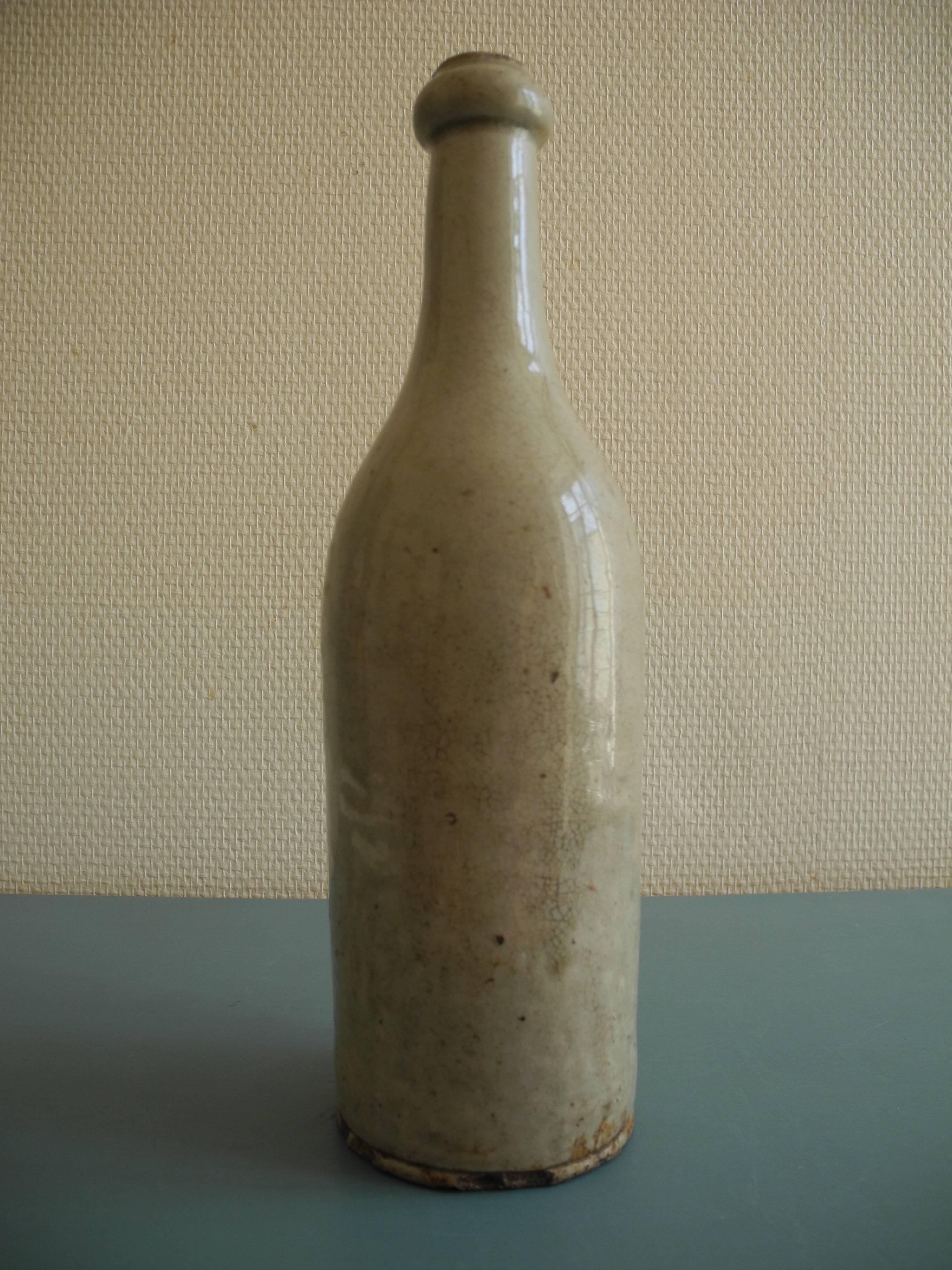 old stoneware bottle for oil wine rustic decor