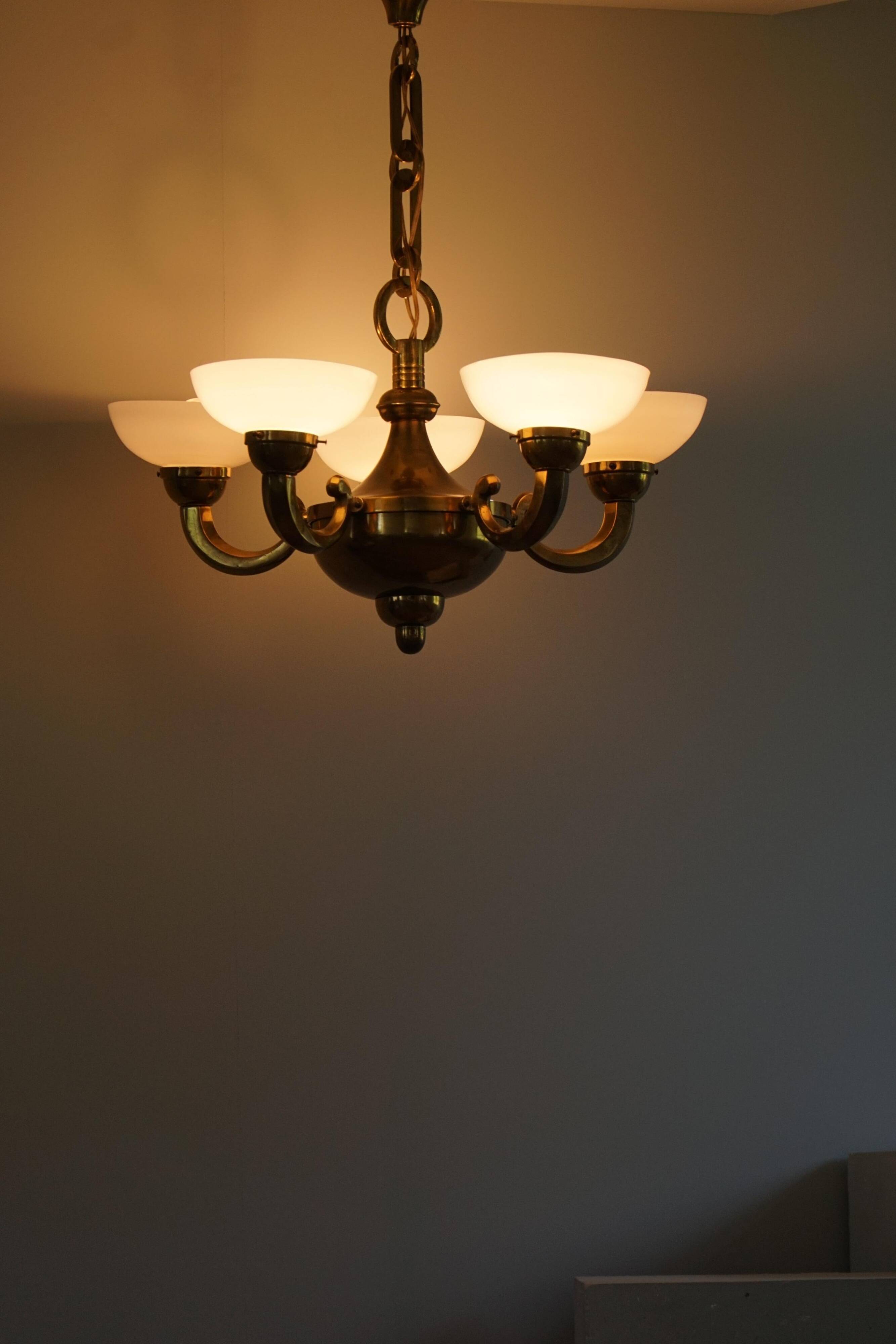A modern Danish Art Deco chandelier, glass and brass, 1940s.