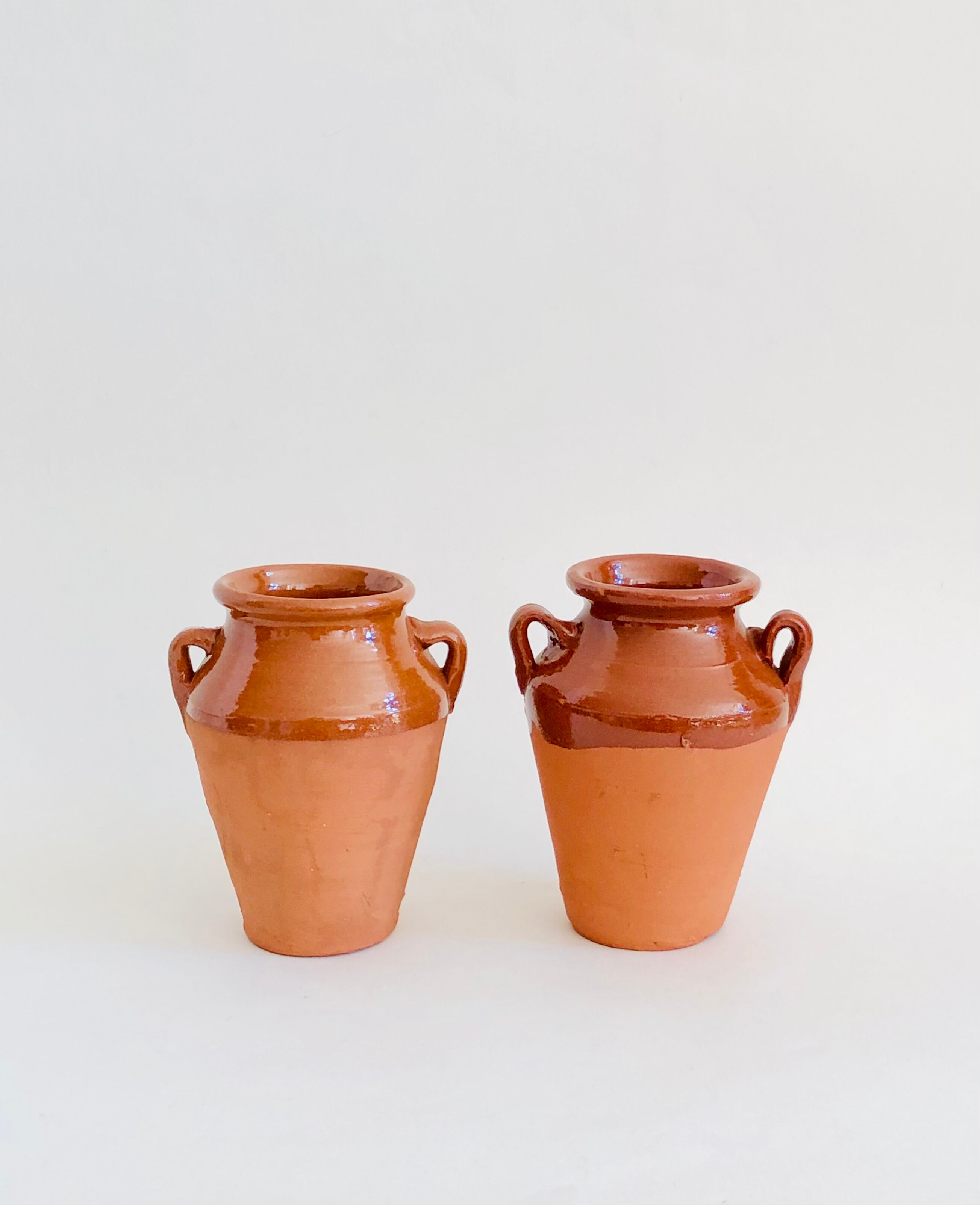 Pair of terracotta amphora vases
