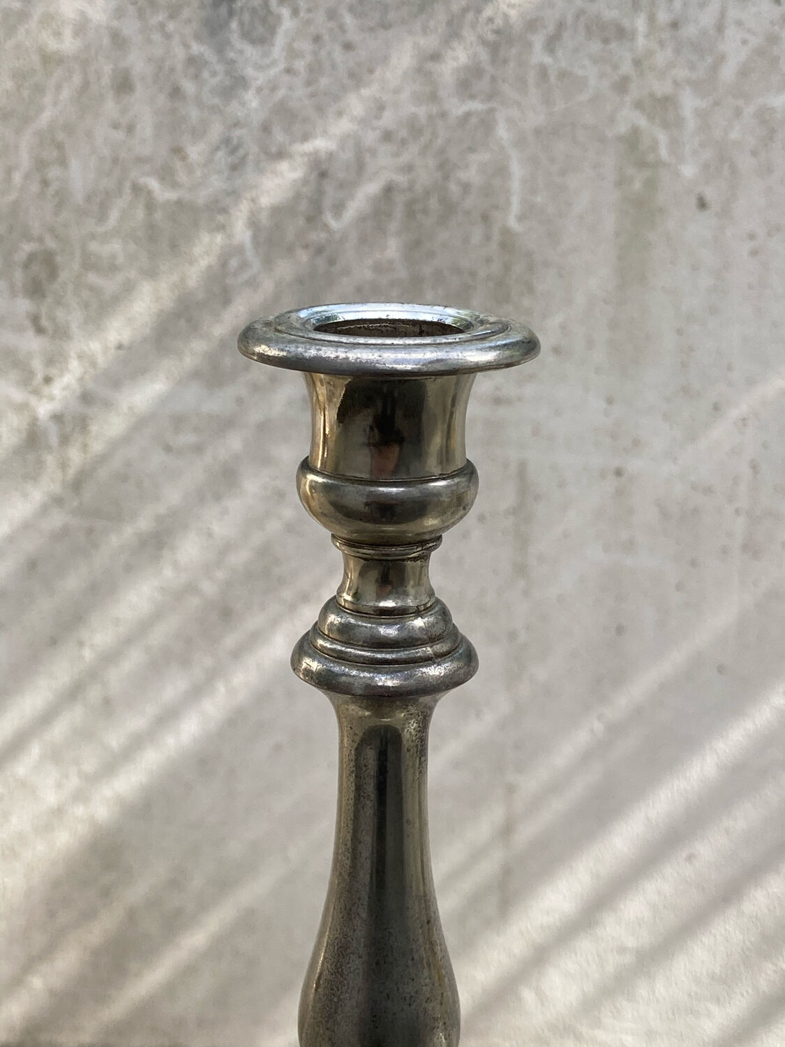 Two antique candle holders