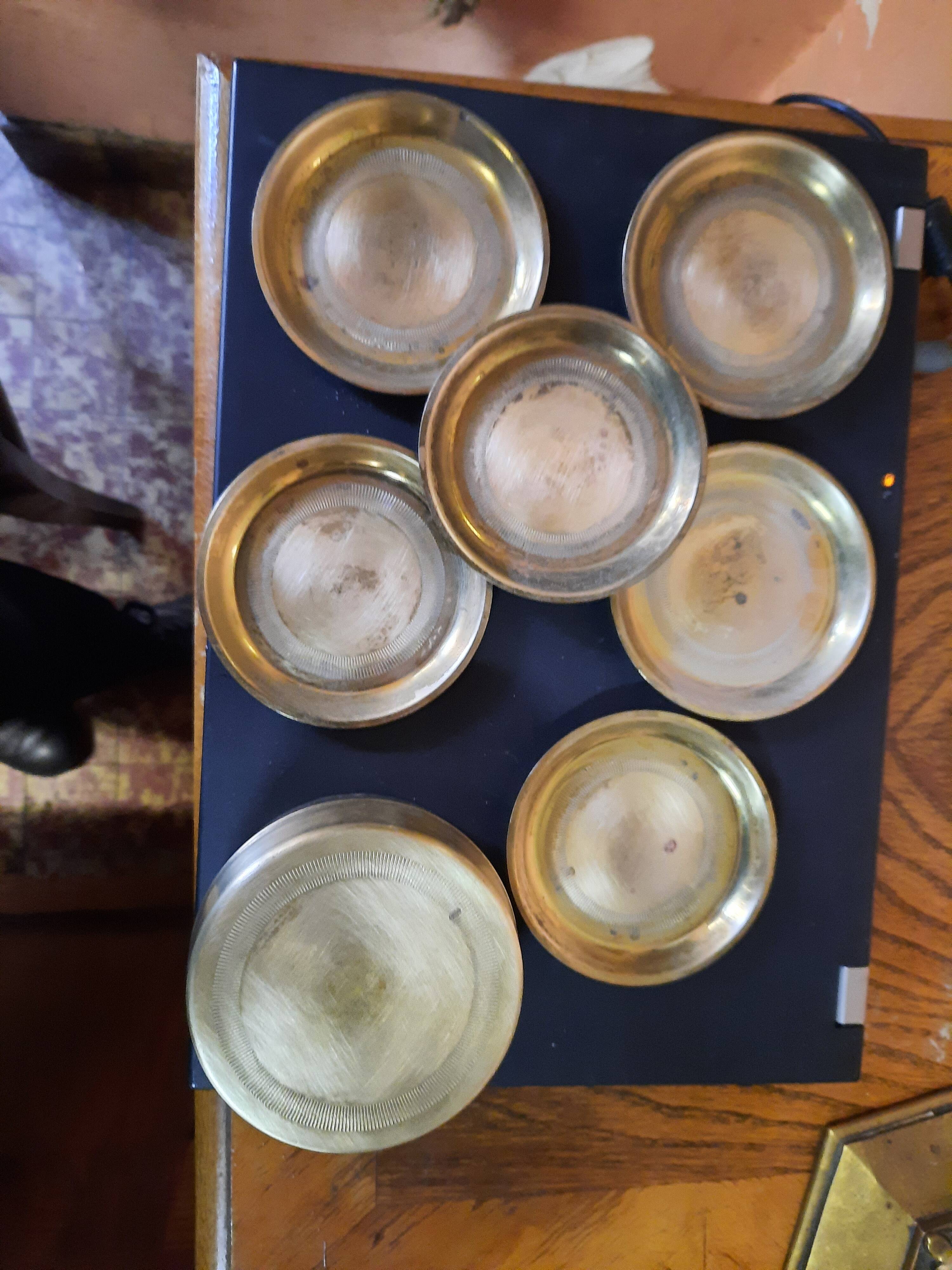 Set of brass coasters