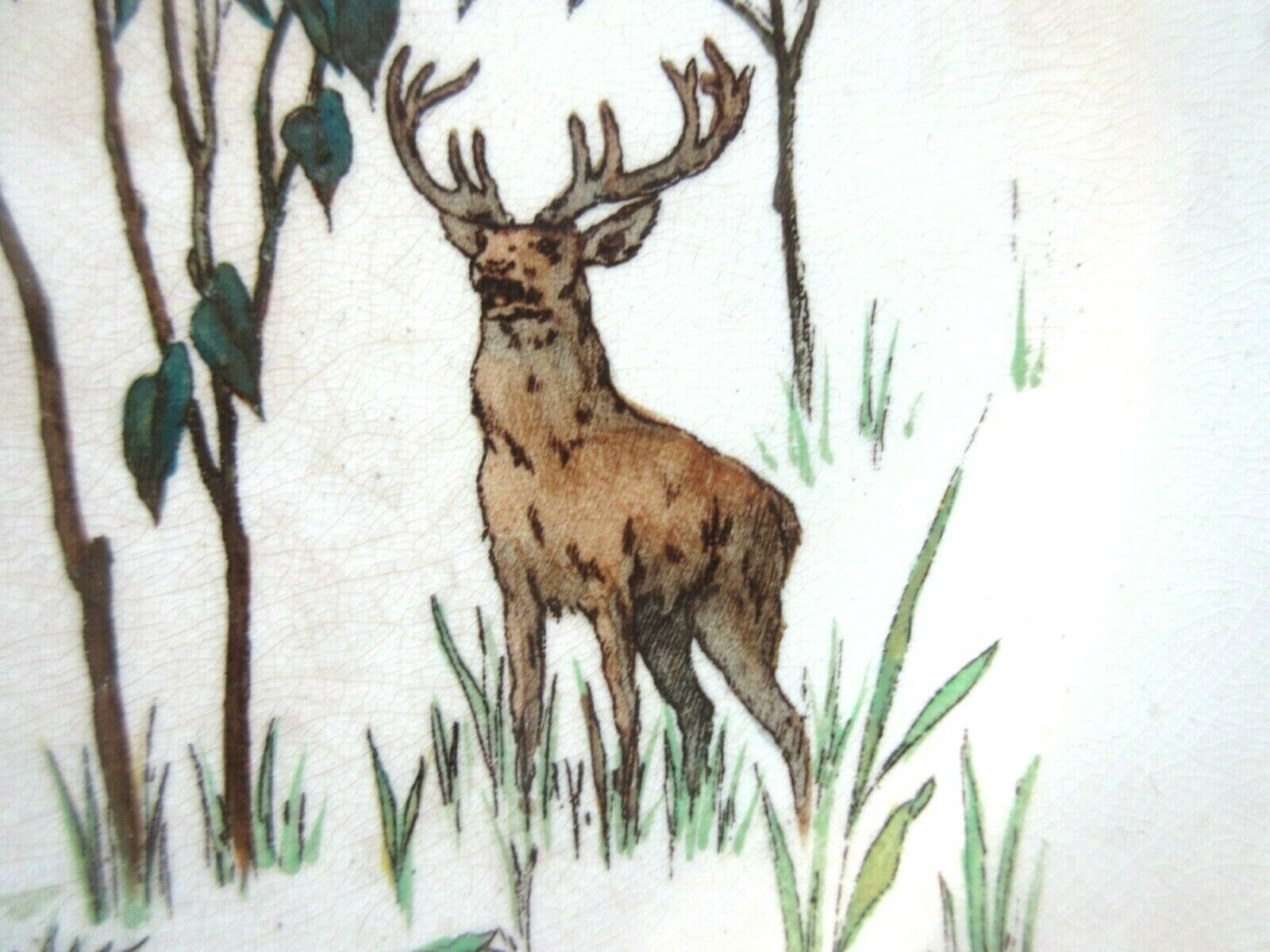Assiette doulton, grands dépôts de paris: la confrontation des cerfs