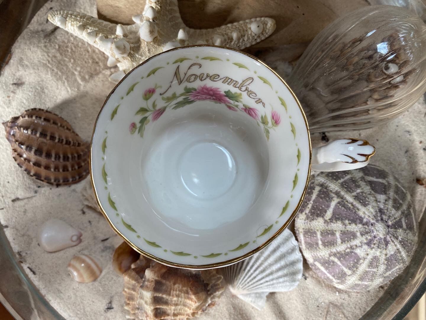 Porcelain cup and sub-cup "November" stamped "Royal Albert"