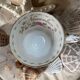 Porcelain cup and sub-cup "November" stamped "Royal Albert"