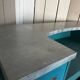 Old wooden trade counter with a zinc top.