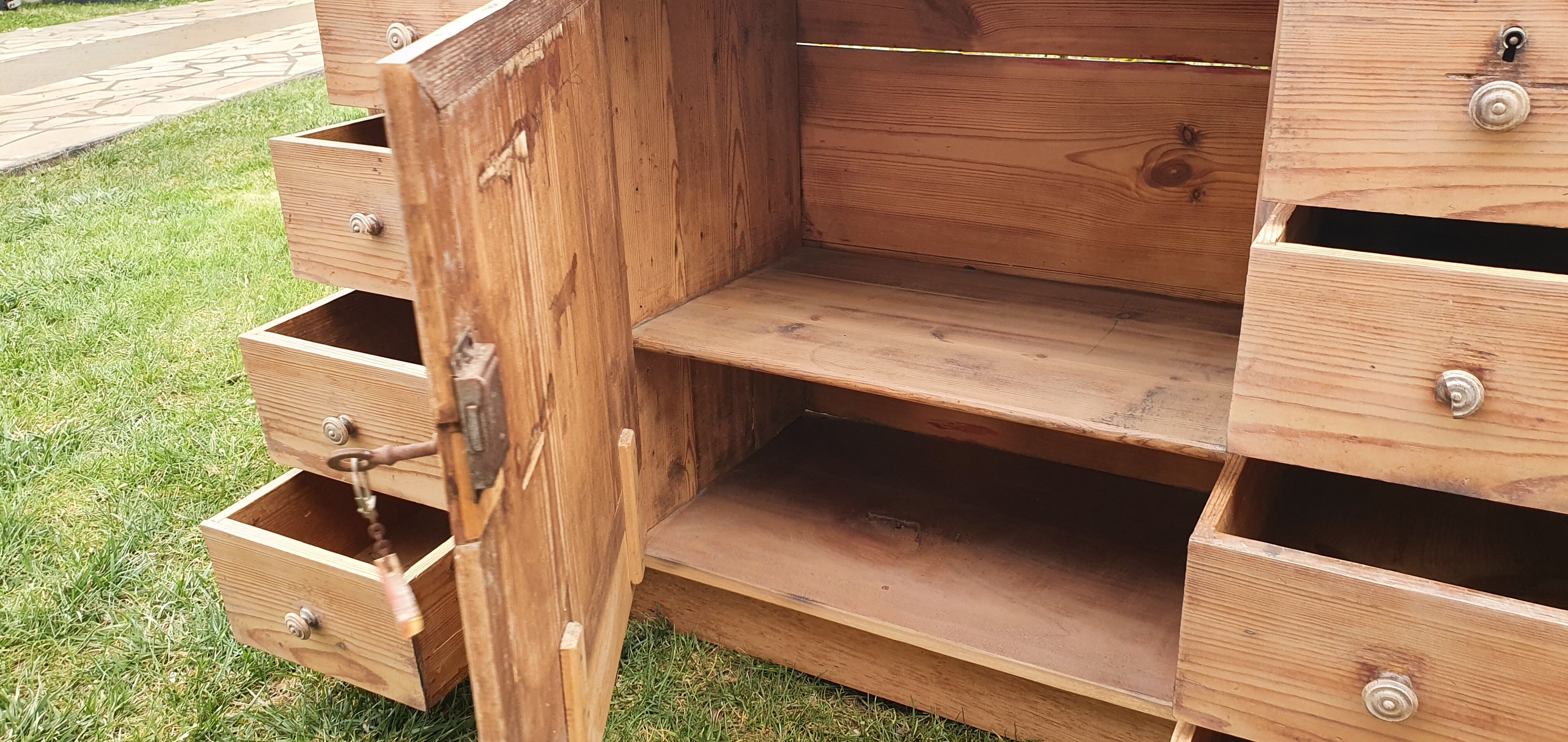 Small pharmacy or school furniture with drawers. 1920.