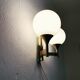Set of 2 brass and opaline glass Sputnik wall lamps by Kaiser Leuchten