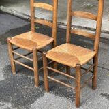 2 solid wood chairs in dark oak and high elephant straw