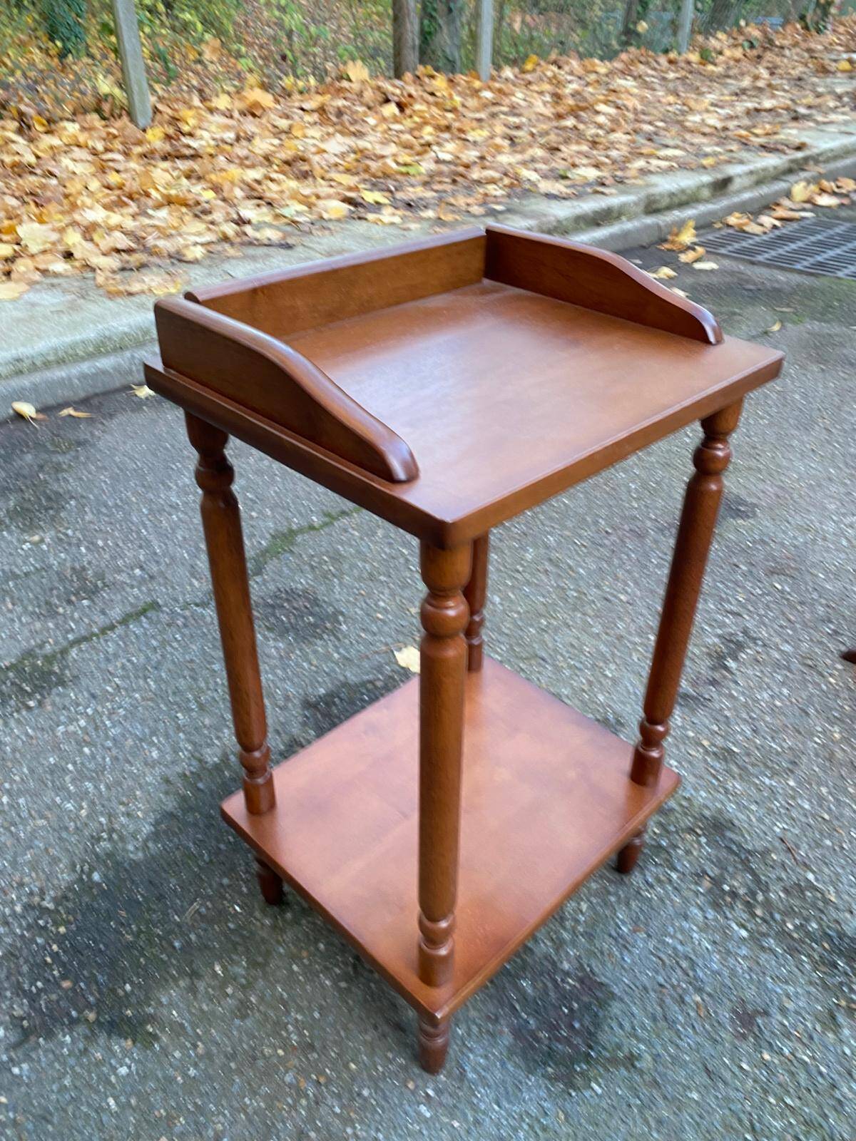 Solid wood shelf with carved legs