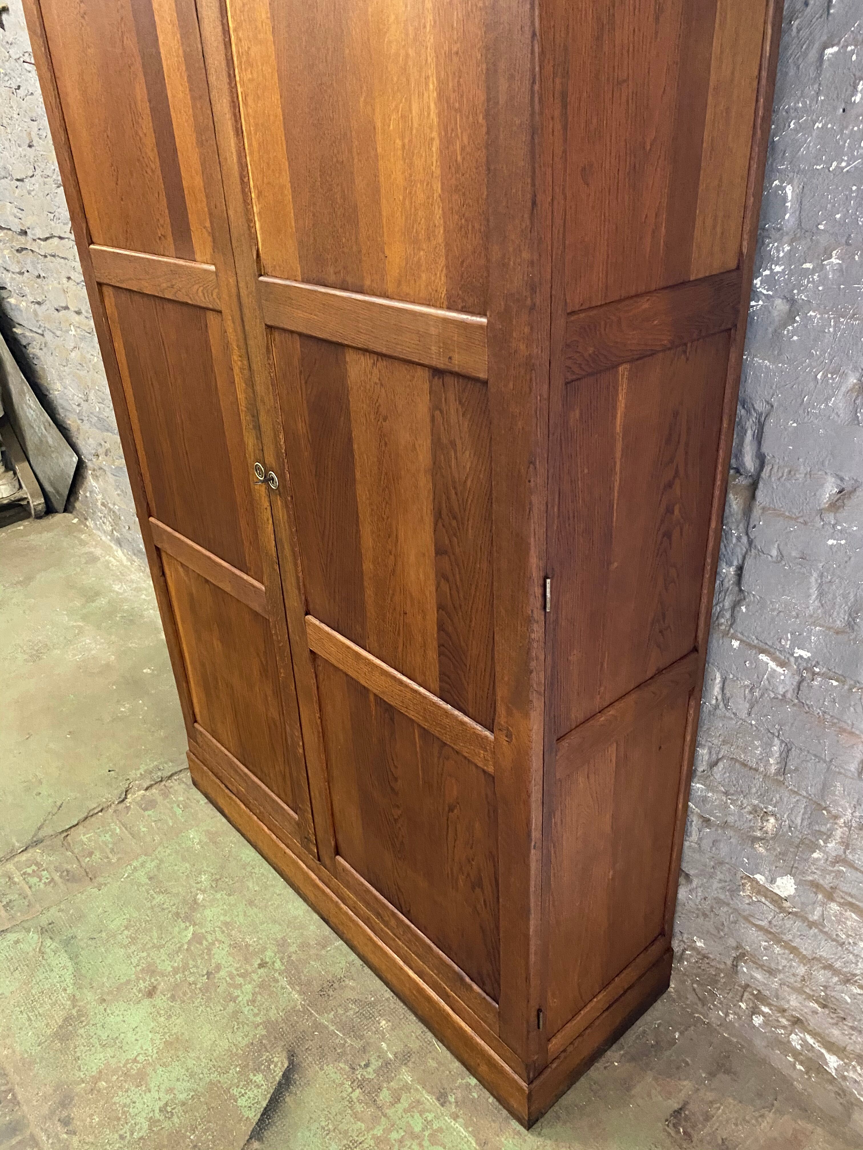 Vintage Parisian solid oak cabinet