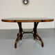 Vintage dining table with a cane top by Mundus from the 1970s.