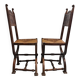 Pair of Neo-Renaissance oak chairs with straw seats, 1910