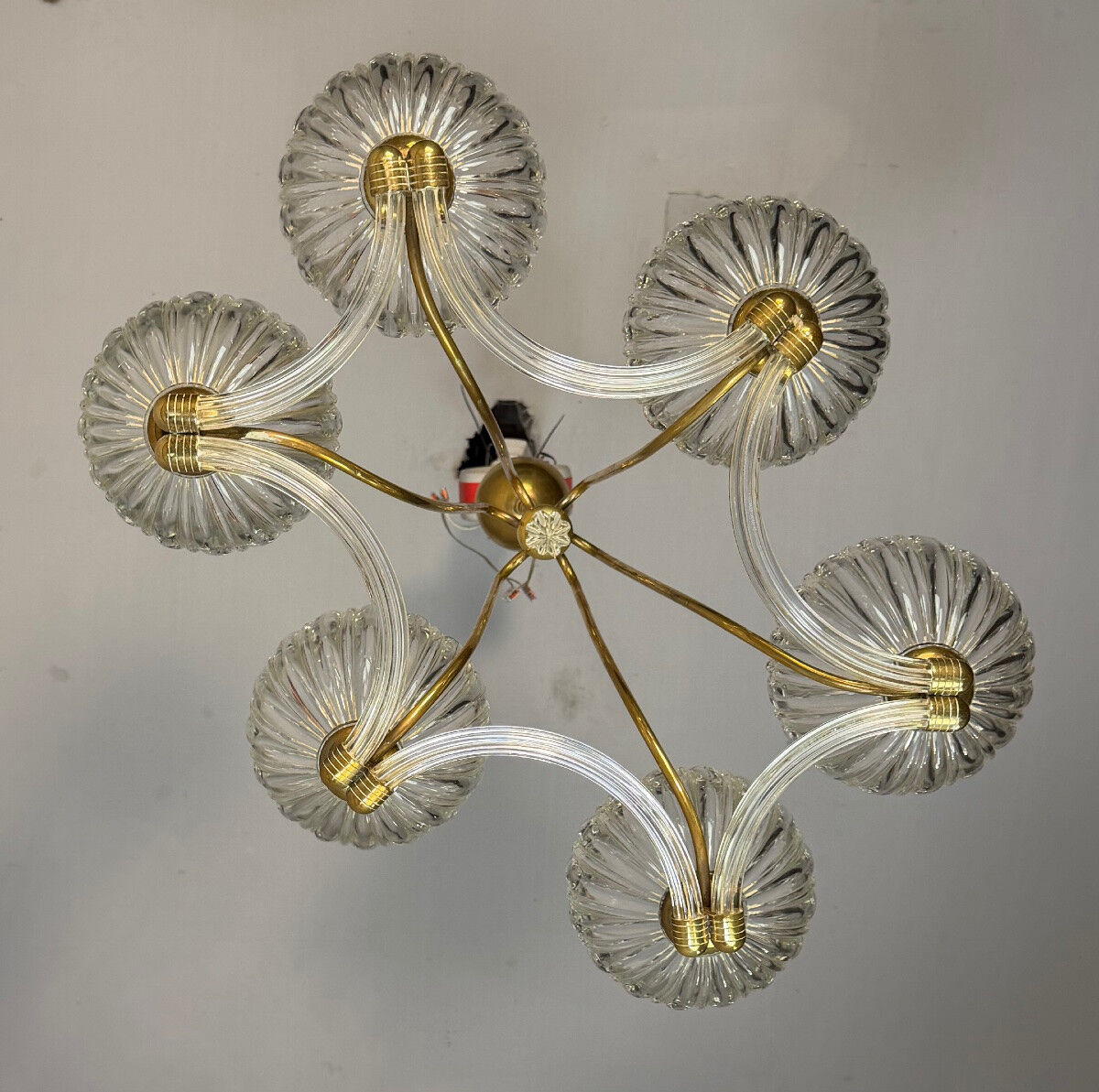 Venetian chandelier in colourless Murano glass and brass, circa 1940.