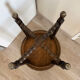 Antique turned wooden side table with authentic charm.