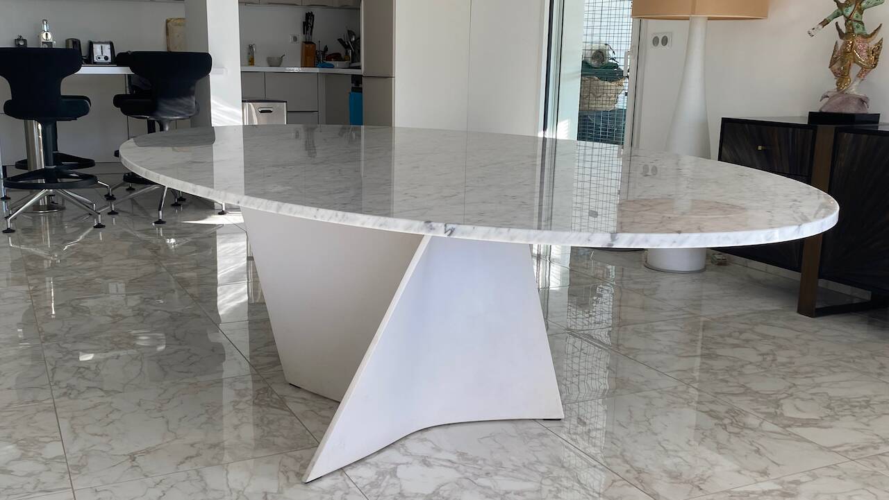 Elliptical table in Carrara marble and Corian attributed to Xavier Lust.