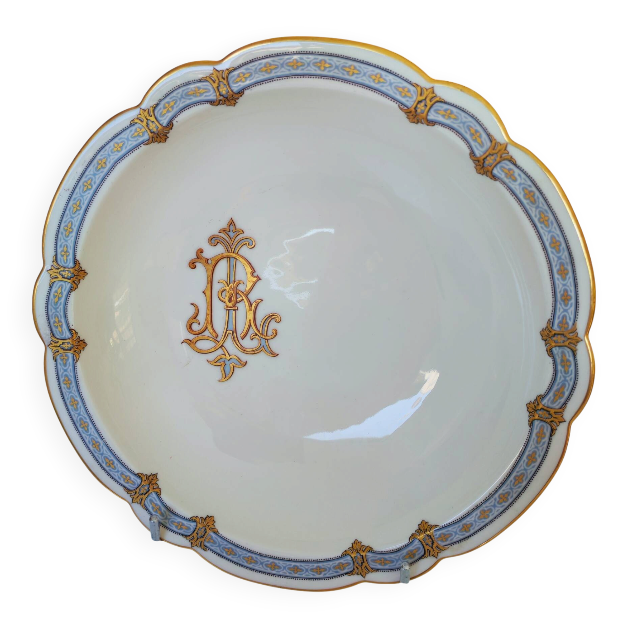 Superb serving dish from the late 19th century with gold and blue decoration.