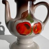 Vintage stoneware teapot with flower and fruit patterns