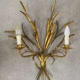 Sconce in golden iron