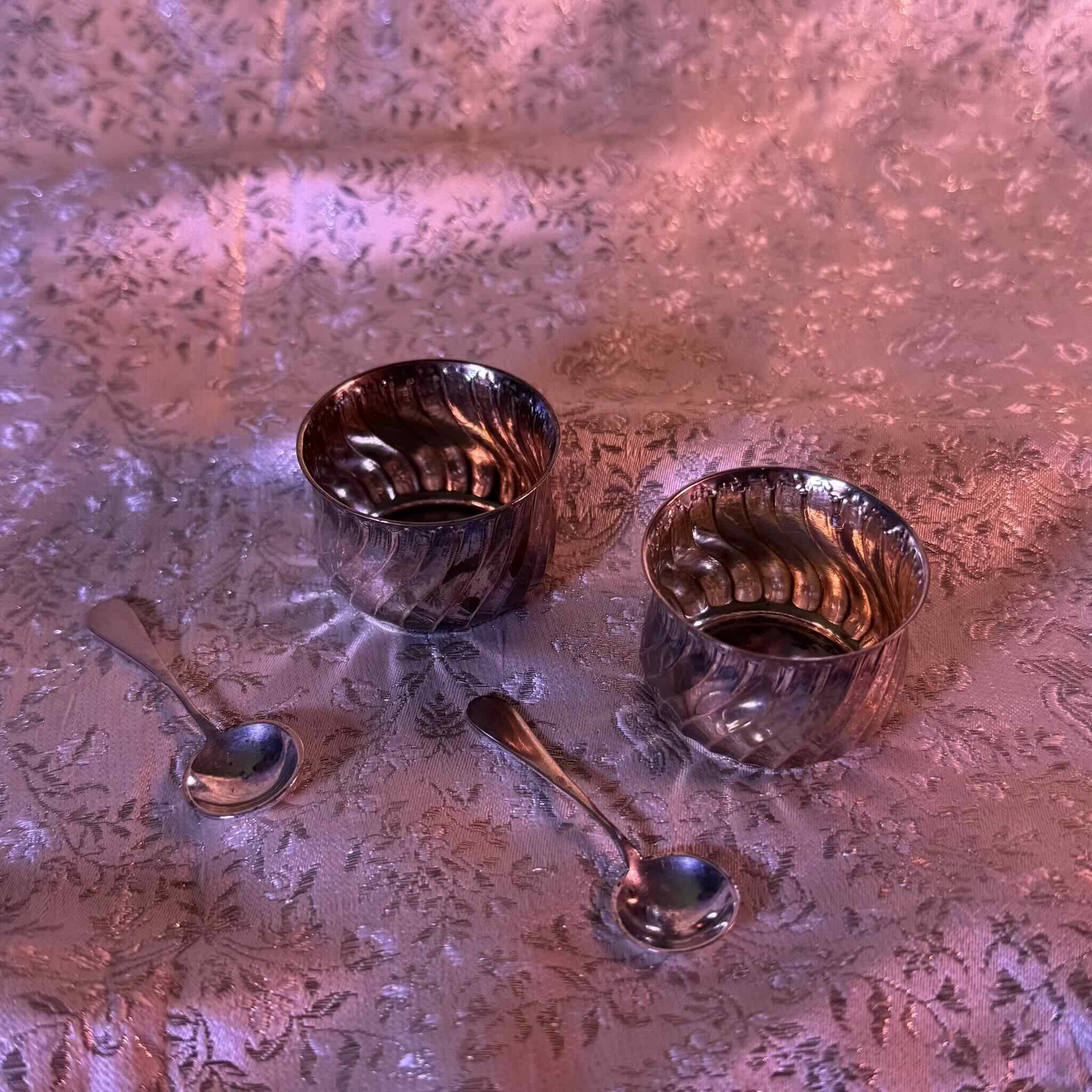 Pair of silver salt cellars and spoons