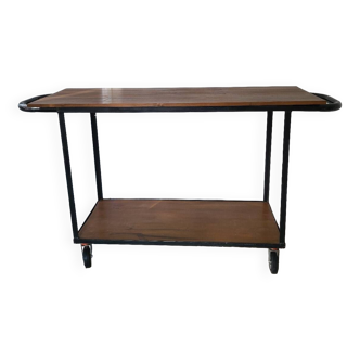 Large central kitchen island trolley on wheels serving industrial console