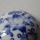 Porcelain pill box decorated with blue and white flowers