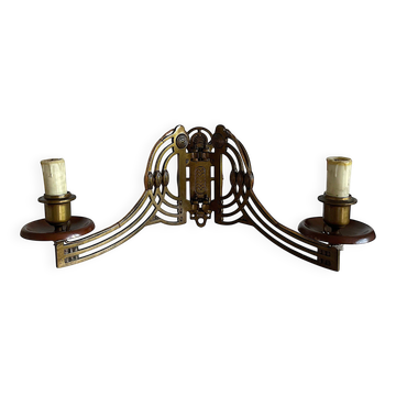 Art Nouveau style brass double piano wall lamp