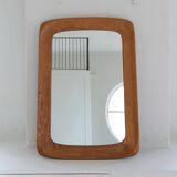 Mid-century modern sculptural wall mirror in stained oak, glass, Glas & Trä 1959