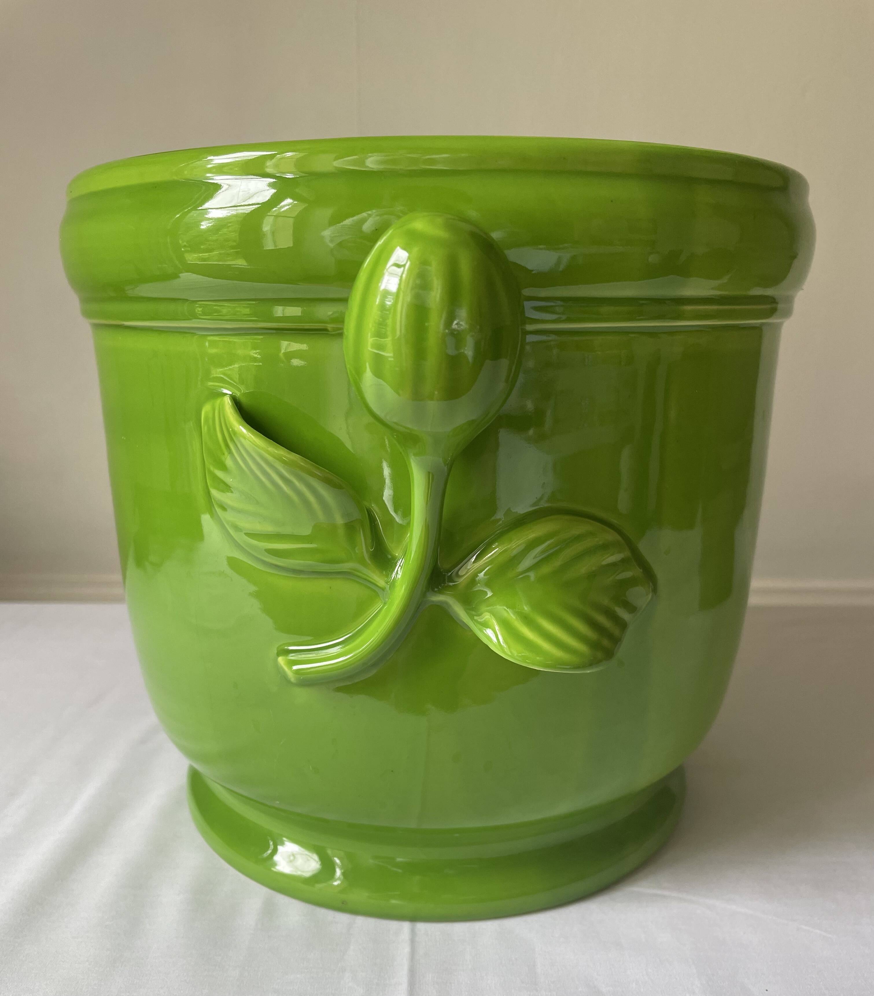 Glazed green pot cover in the style of Moreau Bourg earthenware