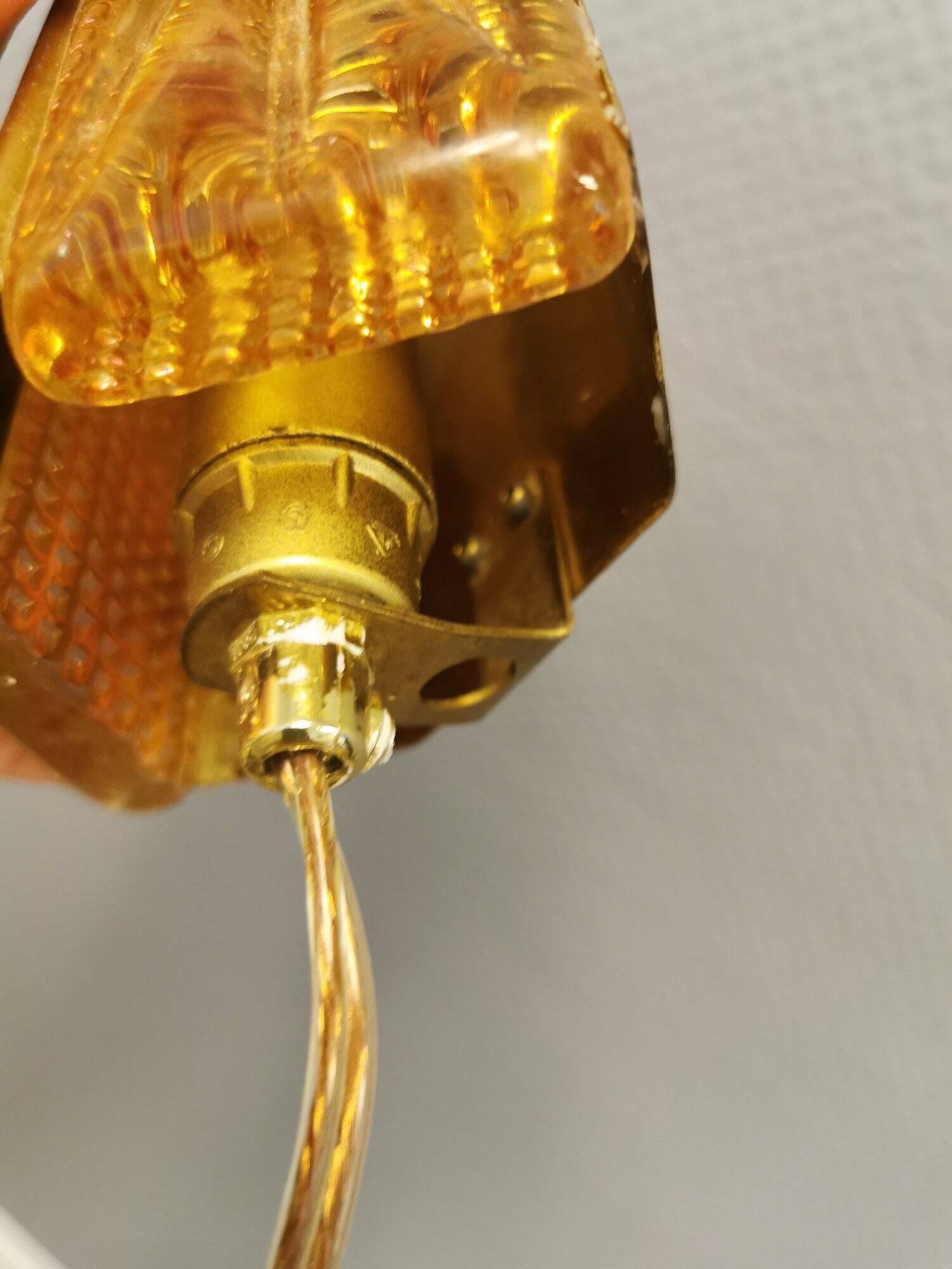 A pair of wall lights with brass-colored suspension with thick pressed glass. Vitrika, Denmark