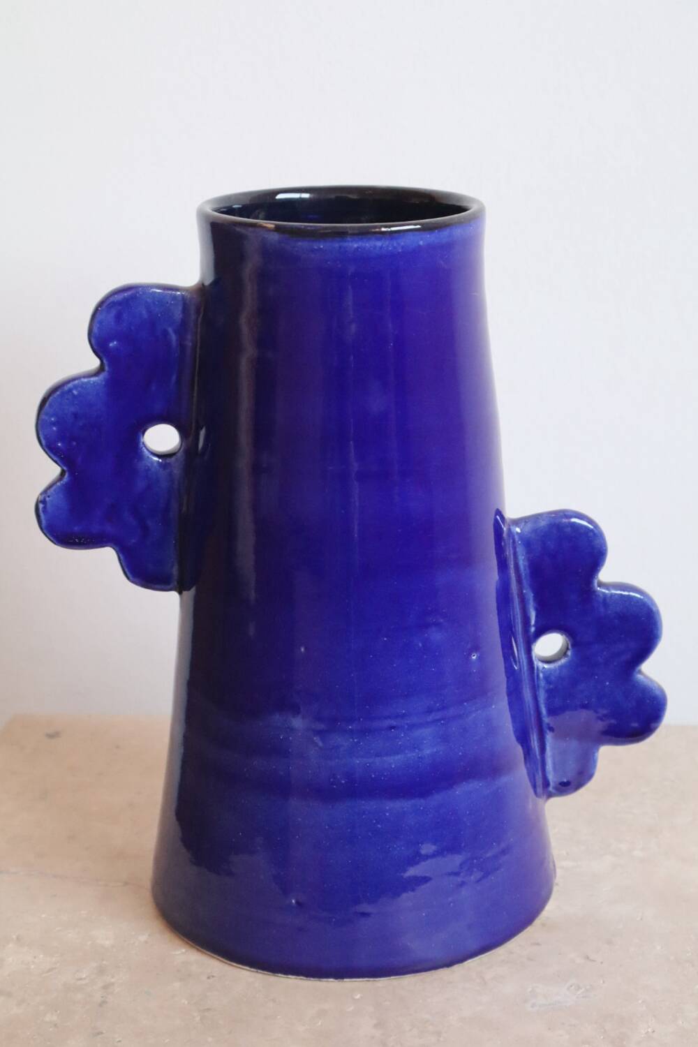 Handmade abstract ceramic vase with asymmetrical floral handles in midnight blue