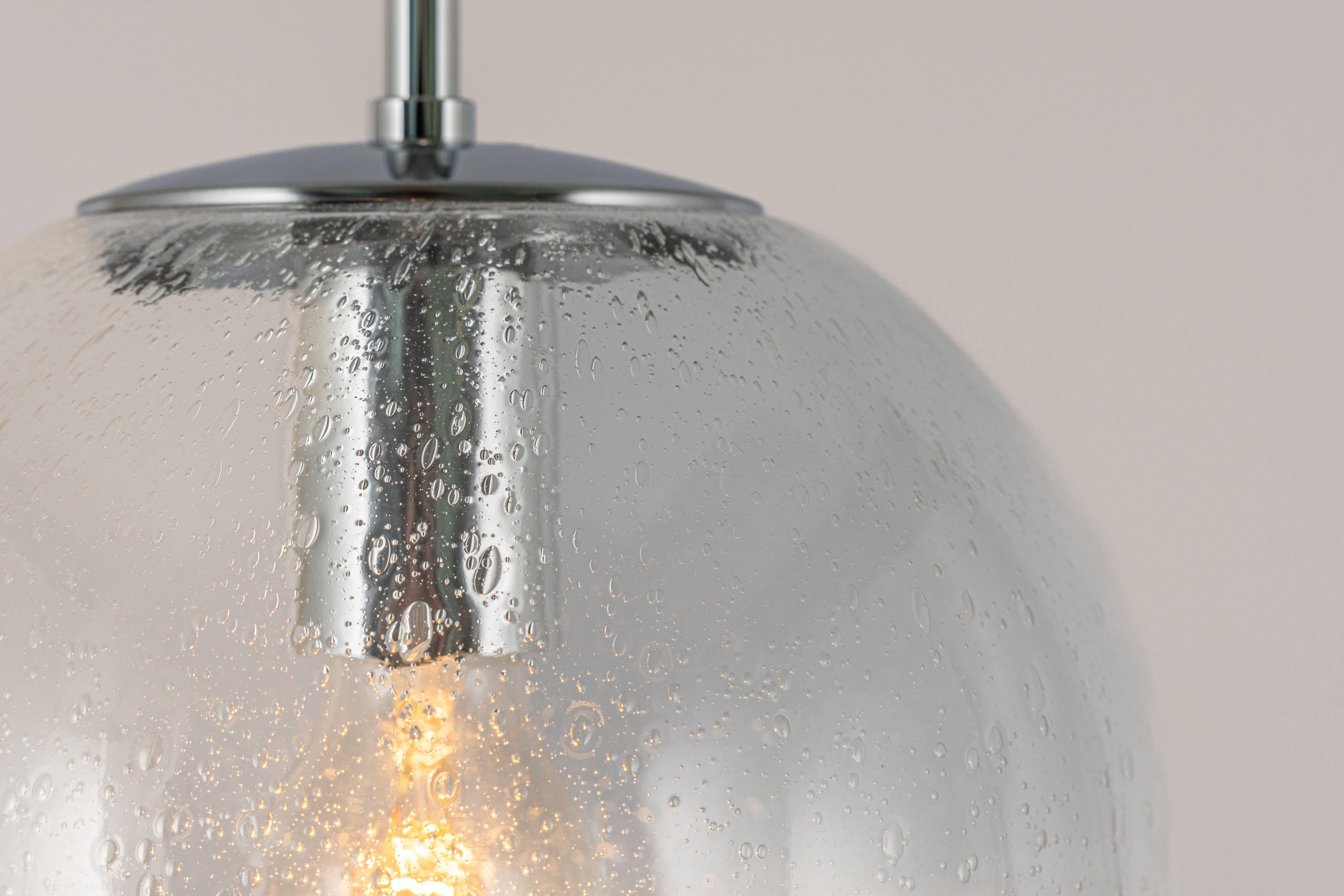Small Limburg chrome pendant light with clear glass globe, Germany, 1970s.