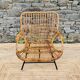 Rattan armchair and black metal base 1960