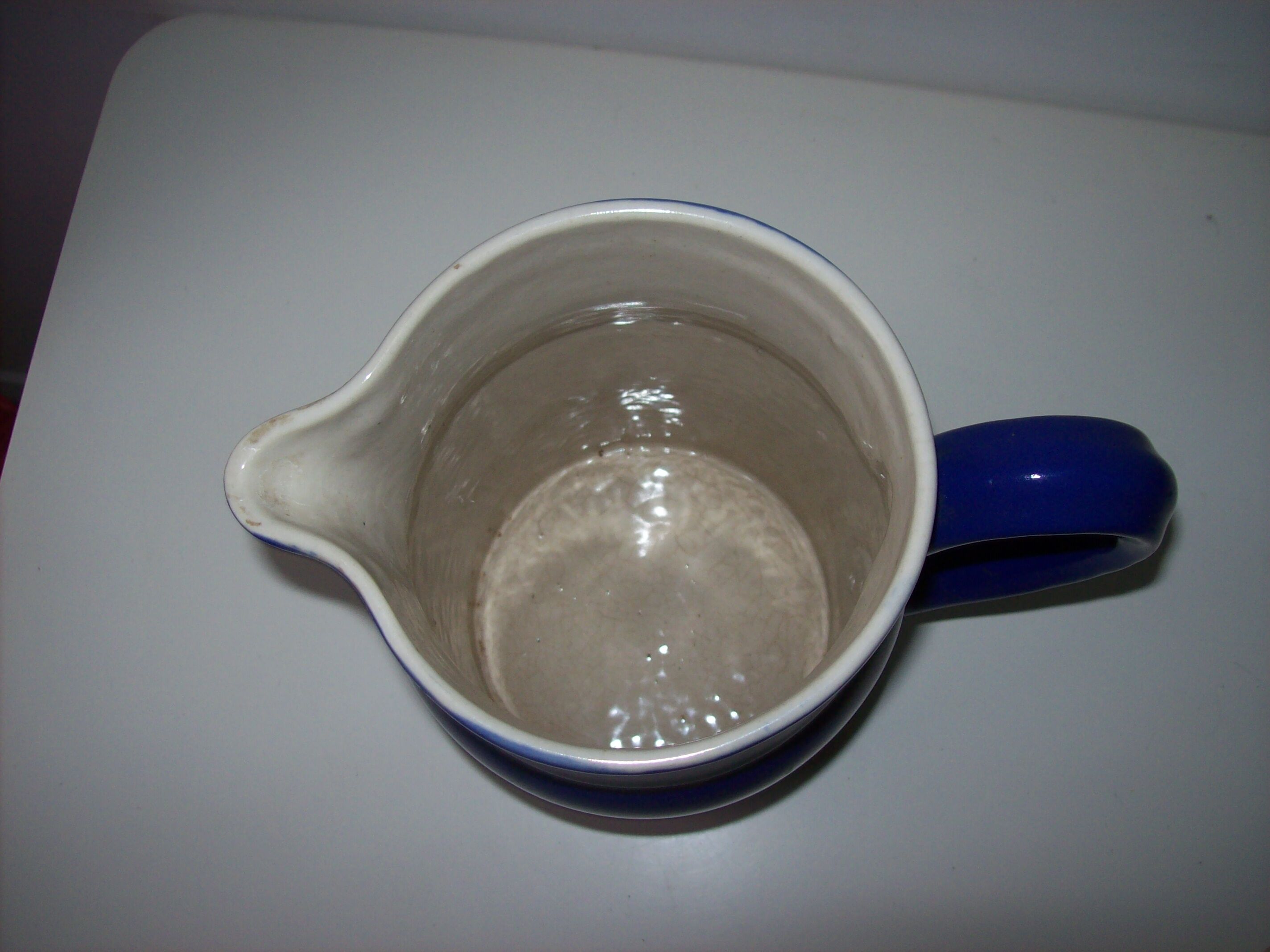 Old blue ceramic Digoin pitcher